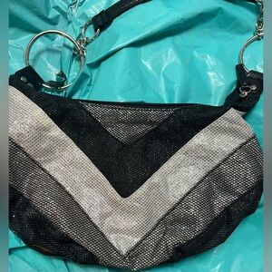 Women’s shoulder purse - black, grey and sliver with jewels.